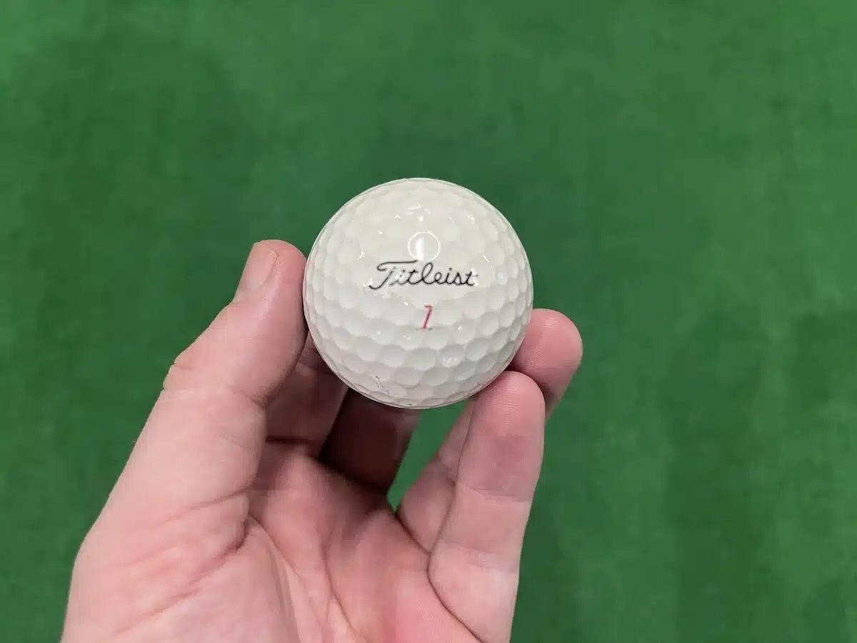 Titleist Prov1x number 1 golf ball hand