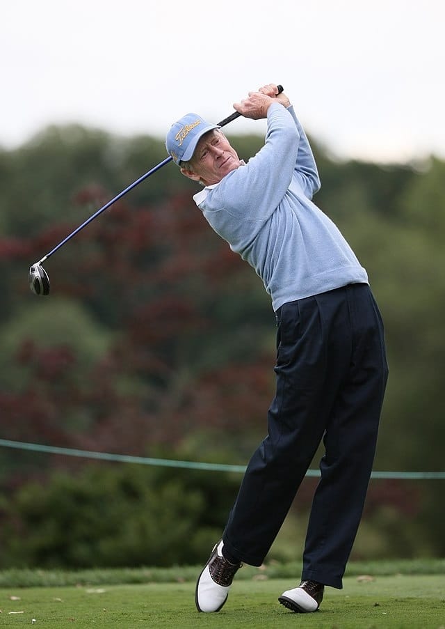 old golfer driving
