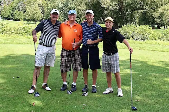 four ball golf group of male golfers at a golf tournament