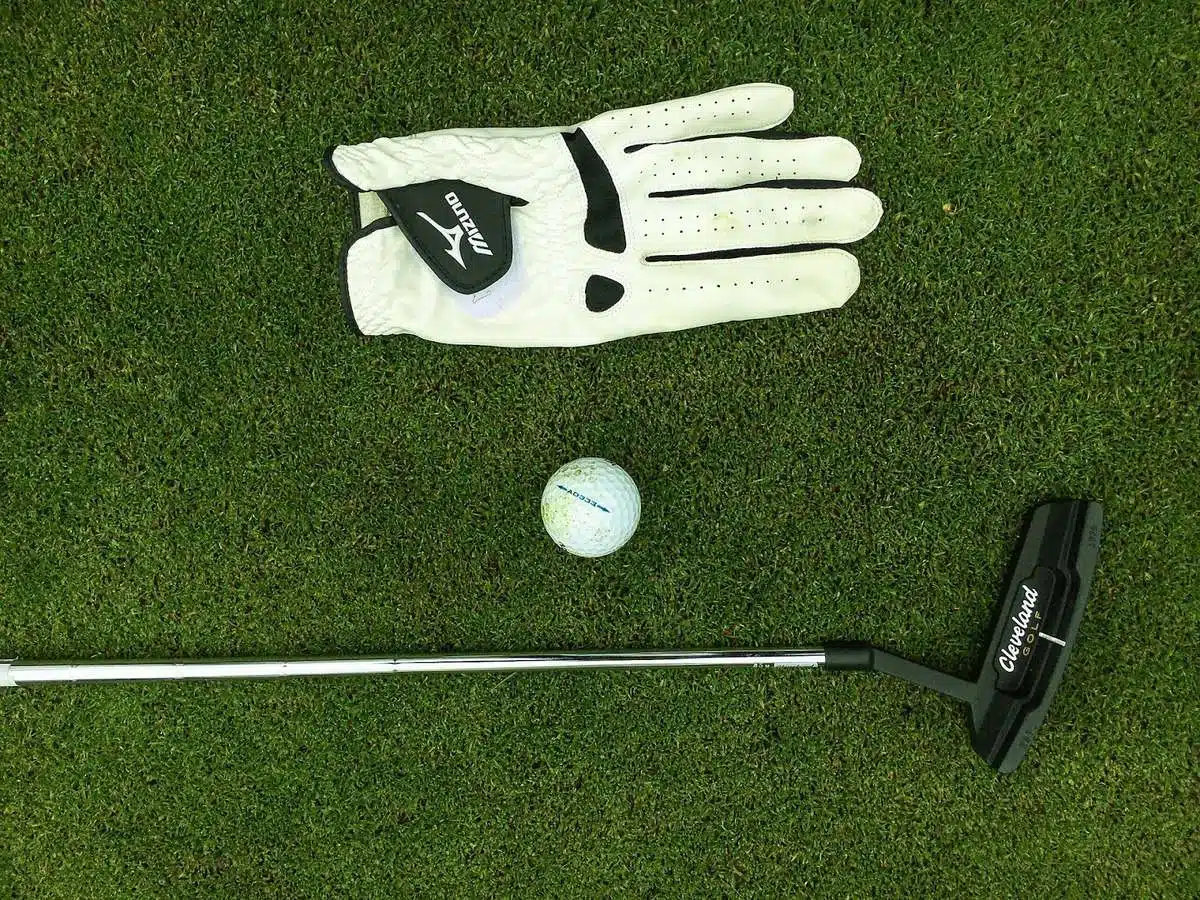 Golf glove and putter and ball