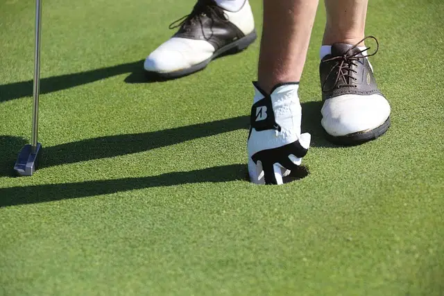 Golfer putts ball in hole with help of golf shoe spikes - Image by <a href="https://pixabay.com/users/woodypino-3423923/?utm_source=link-attribution&amp;utm_medium=referral&amp;utm_campaign=image&amp;utm_content=1866103">Josef Pichler</a> from <a href="https://pixabay.com//?utm_source=link-attribution&amp;utm_medium=referral&amp;utm_campaign=image&amp;utm_content=1866103">Pixabay</a>