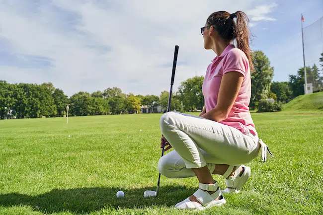 Golfer-in-sunglasses-looking-into-the-distance-2021-09-03-14-19-59-utc