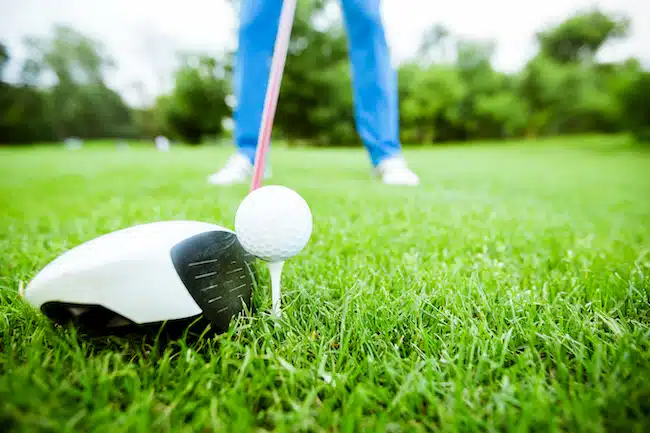 Golfer getting ready to take a shot