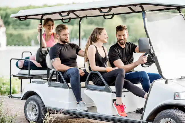 Friends in the golf cart