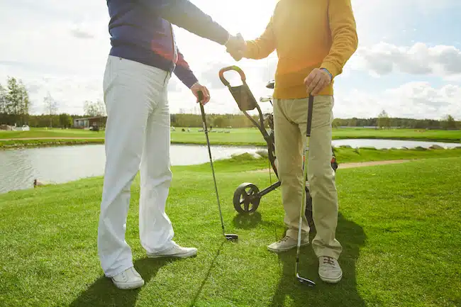 Greeting of golf players