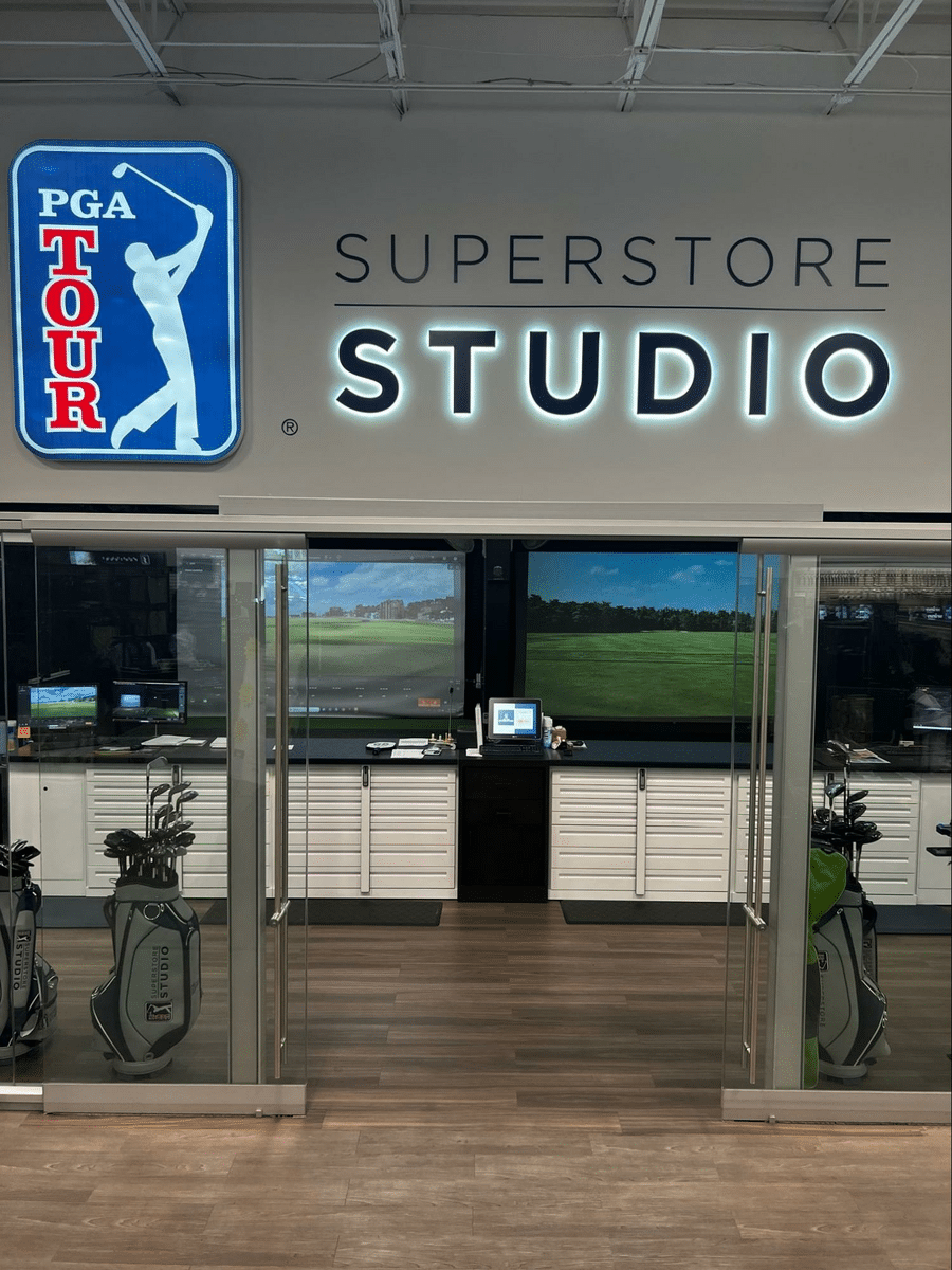 pga tour superstore studio opening with hitting bays behind