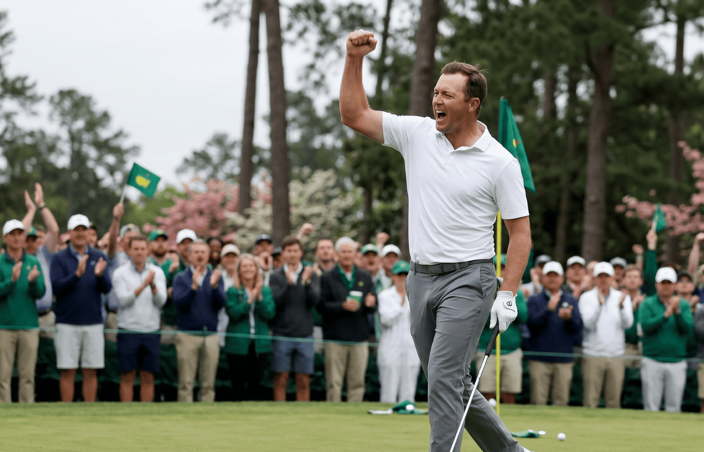 A pro golfer celebrating a putt.