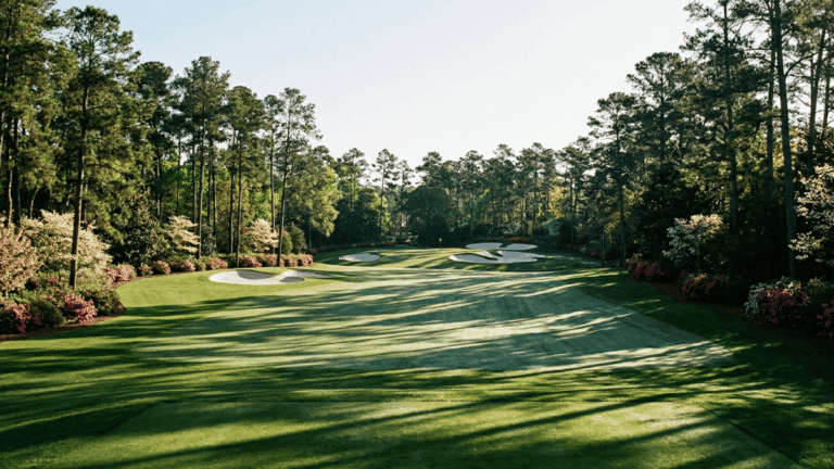 The fairway lined with trees at Augusta National.