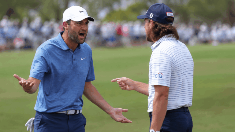 Two golfers arguing on a fairway.